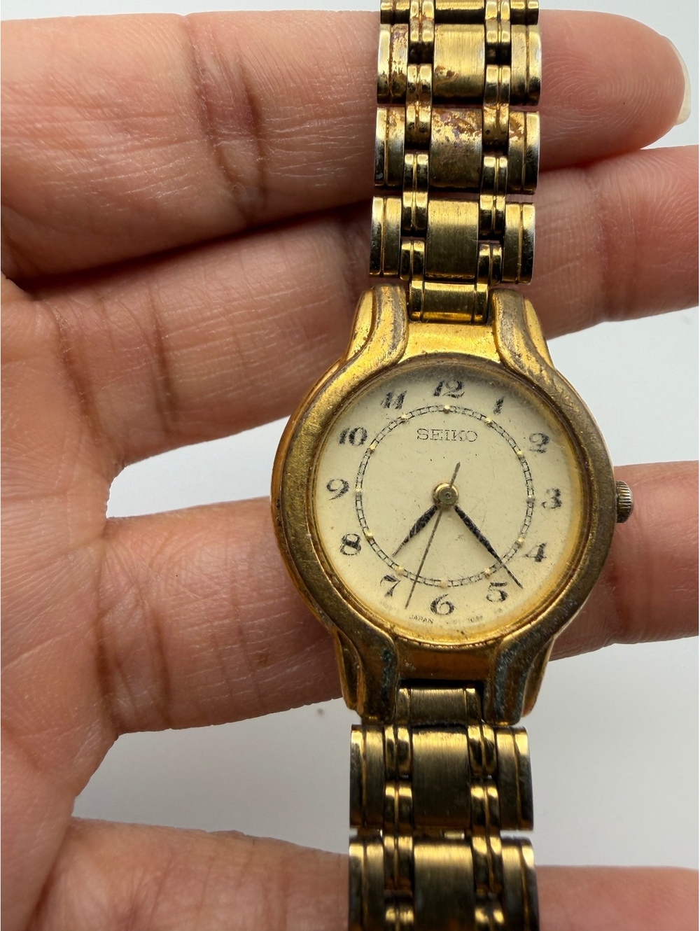 Gold tone cream dial wristwatch